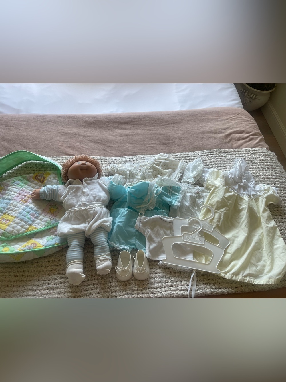 collection of vintage Cabbage Patch Kids dolls and accessories from the 1980s